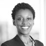 Black & white headshot of Adjoa smiling